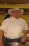Web Roth during an auction held under the grandstands at the Winfield Fairground